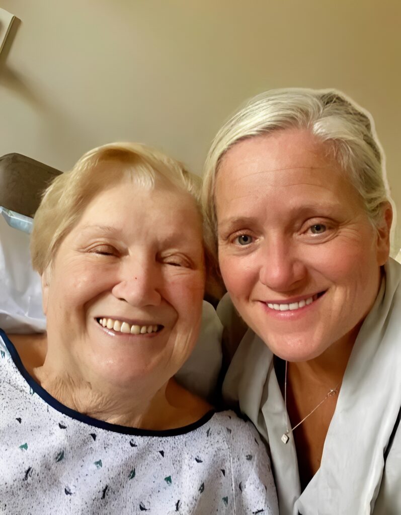 Smiling older woman and younger woman selfie