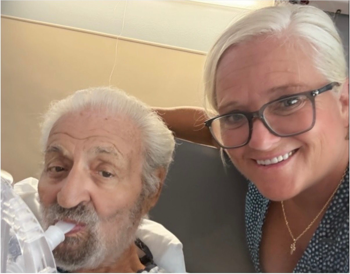 Woman with a patient in a hospital